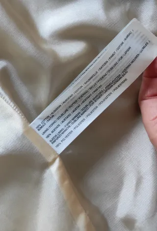 Abrigo mujer Mango marrón con detalles dorados