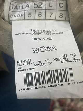 Chaqueta de traje gris y beige