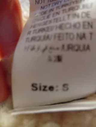 Chaqueta polipiel negra y beige