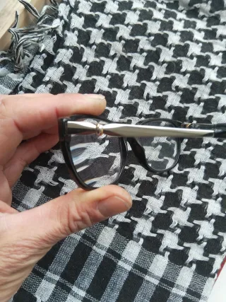 Cartier Gafas de vista negras y doradas