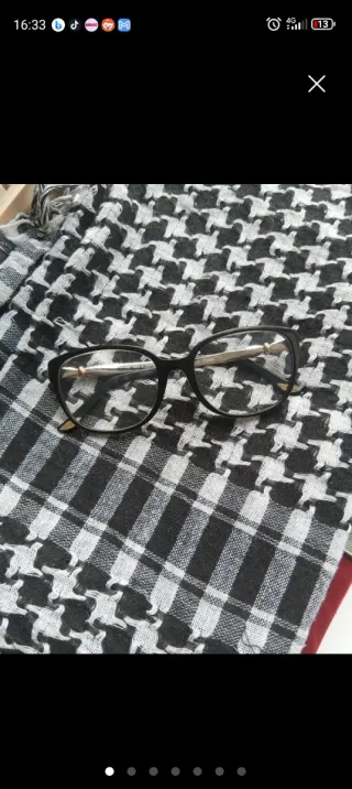 Cartier Gafas de vista negras y doradas