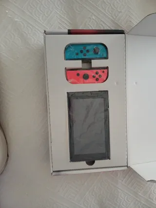 Nintendo Switch Azul y Rojo(PRECIO NEGOCIABLE)