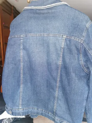 Chaqueta tejana desgastada