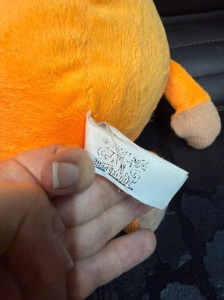 Boneco de pelúcia laranja