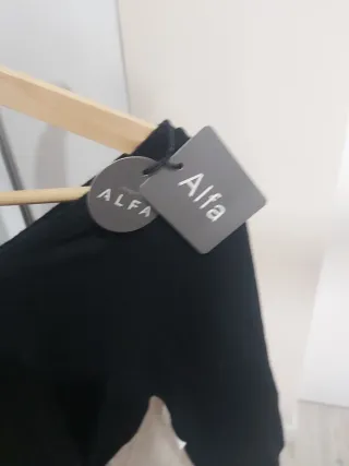 Conjunto vestido y chaquetilla negro