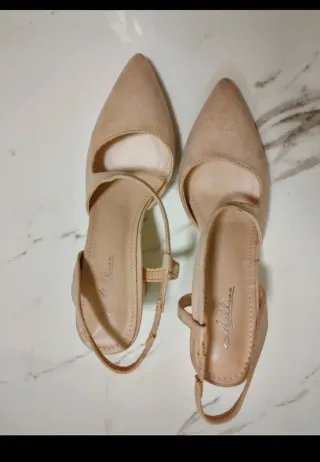 Scarpe con tacco basso