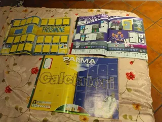 Tre album Calciatori Panini