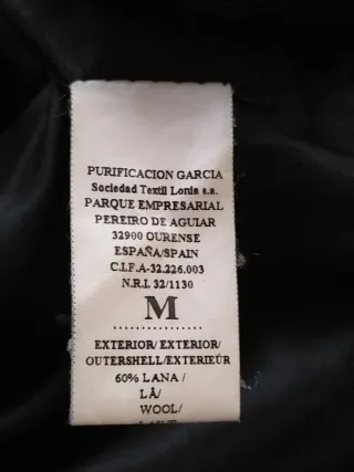 Chaqueton negro con cinturón Purificación García