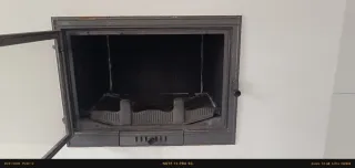 Chimenea leña fundición puerta cristal