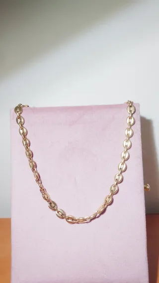 Colgante de acero dorado