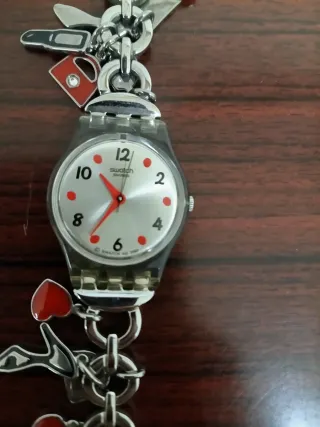 Orologio Swatch donna con ciondoli + batteria