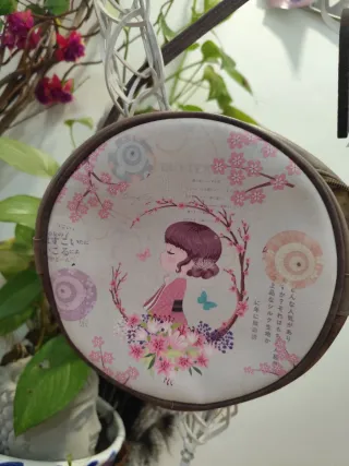 Bolso redondo estampado niña