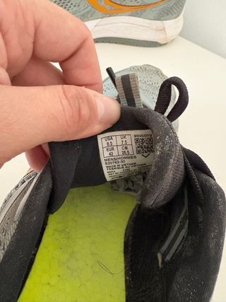 Zapatillas running Saucony grises y naranjas