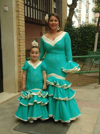 Traje de flamenca verde con volantes