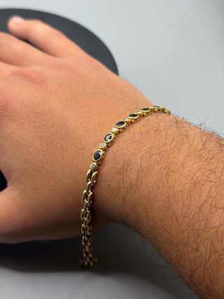 Pulsera de oro de 18k con diamantes y zafiro