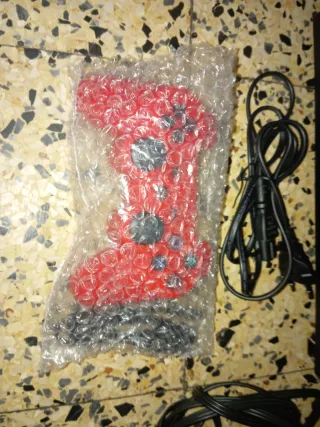 Consolas PS2, PS3 y PS4 con mandos