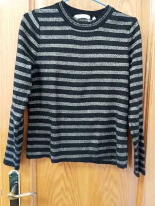 Jersey de rayas negras y doradas