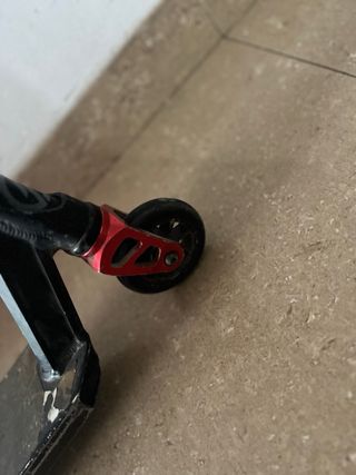 Patinete freestyle negro y rojo