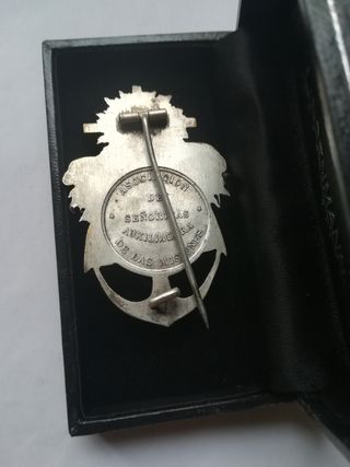 Insignia antigua globo ancla cruz