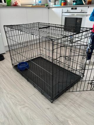 Jaula para perros grandes negra casi sin uso