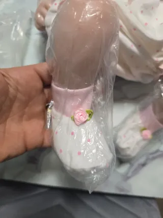 Bambola reborn con vestitino rosa