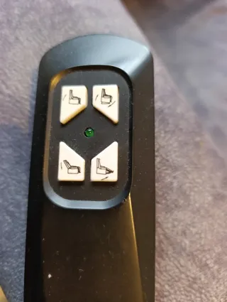 Sillón reclinable gris tela