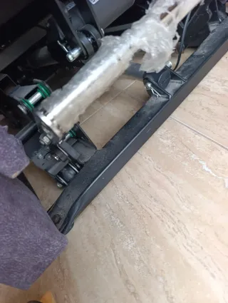 Sillón reclinable gris tela