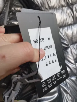 Plumífero largo plateado mujer