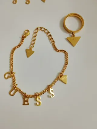 Disponible Conjunto completo Guess Acero Dorado