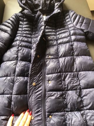 Piumino blu con cappuccio