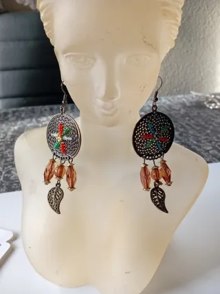 Dos pares de pendientes dorados