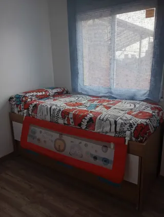 Cama nido con barrera protectora