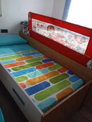 Cama nido con barrera protectora