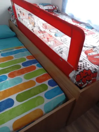 Cama nido con barrera protectora