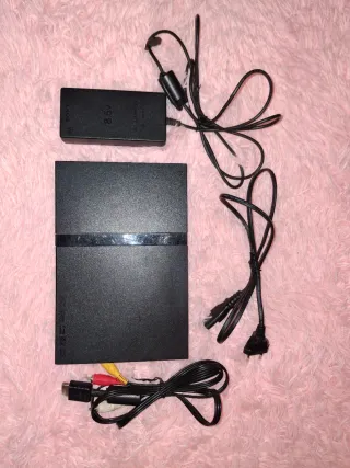 PlayStation 2 Slim Negra funcionando