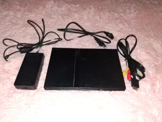 PlayStation 2 Slim Negra funcionando