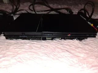 PlayStation 2 Slim Negra funcionando