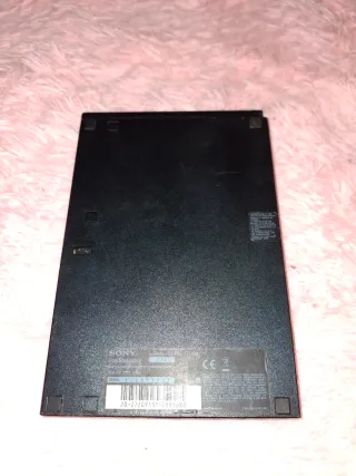 PlayStation 2 Slim Negra funcionando