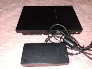PlayStation 2 Slim Negra funcionando