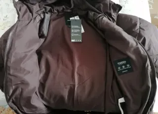 Abrigo acolchado largo marrón Stradivarius