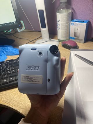 Camara intax mini 12 en azul pastel casi sin uso