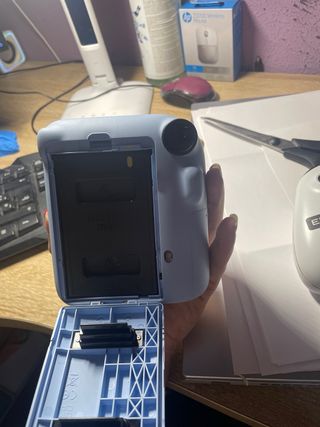 Camara intax mini 12 en azul pastel casi sin uso