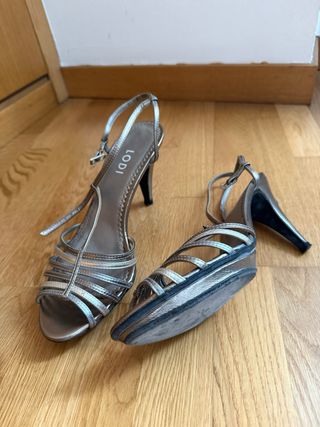 Sandalias de piel plateadas puestas 1 vez