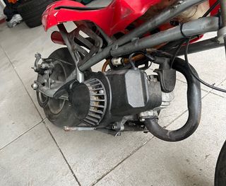 Minimoto de carreras + repuestos