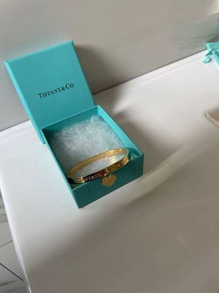 Bracciale Tiffany & Co. con doppio ciondolo