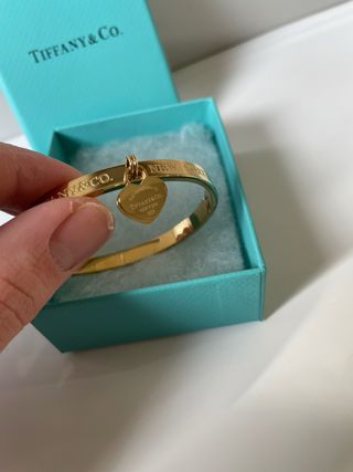 Bracciale Tiffany & Co. con doppio ciondolo