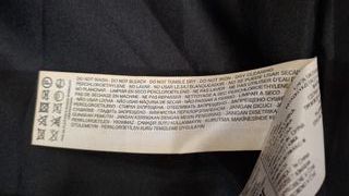 Elegante abrigo pelo sintético negro