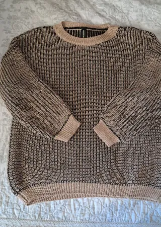 Jersey dorado y negro de punto