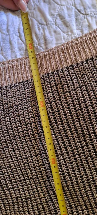 Jersey dorado y negro de punto