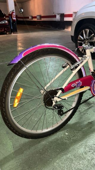 Bicicleta Btwin niña rosa y crema